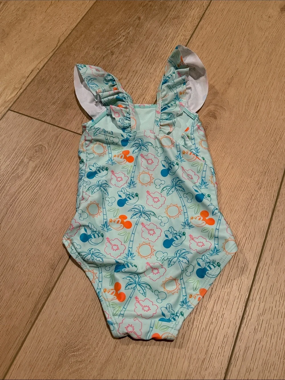 Girl's Disney Light Aqua Tropical Print One-Piece Swimsuit. No flaws.